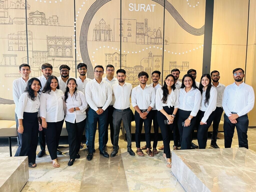 About VRSapients Team of Outsourced Accounting Professionals Standing Outside Office Tower